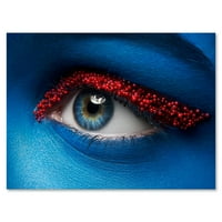 Designart 'Woman Eye With Blue Paint On Face & Red Balls' Modern Canvas Wall Art Print